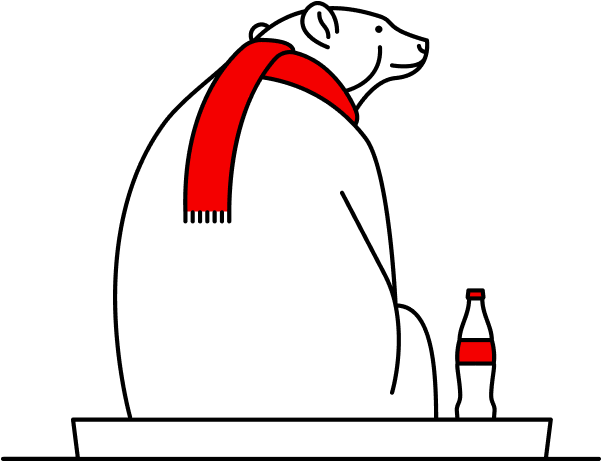 Image of the Coca-Cola Bear sitting down next to a bottle of Coca-Cola